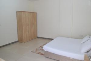 En eller flere senge i et værelse på Aknan 01 - Center Market