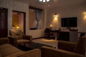 TV o dispositivi per l'intrattenimento presso RATNA HOTEL