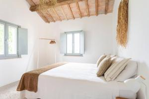 Postel nebo postele na pokoji v ubytování Casa Caminate - La Quercia