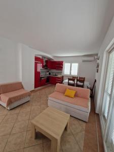 Postel nebo postele na pokoji v ubytování Apartmani Sofija