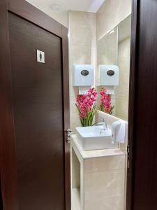 Koupelna v ubytování Garni Hotel Aline