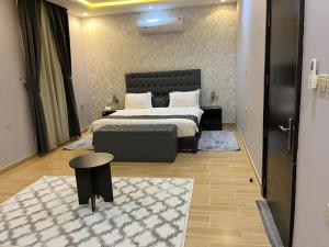 Postelja oz. postelje v sobi nastanitve Riyadh Inn Hotel