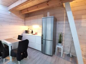 Η κουζίνα ή μικρή κουζίνα στο Lakeside Cottages Jyväskylä