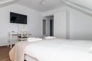 Postel nebo postele na pokoji v ubytování Casa Teodor