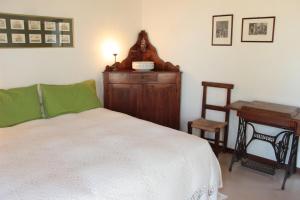 A bed or beds in a room at Agriturismo Ponterosa