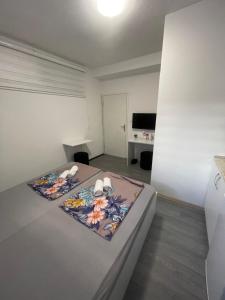 a bedroom with a bed in a room at Apartments Glitter in Mostar