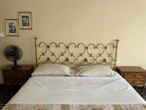 GASTALDI ROOMS - Old Style tesisinde bir odada yatak veya yataklar