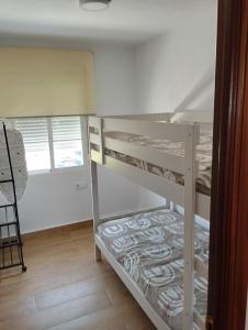 Postel nebo postele na pokoji v ubytování Casa juani