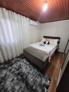 Postel nebo postele na pokoji v ubytování Casa Justi Oliveira
