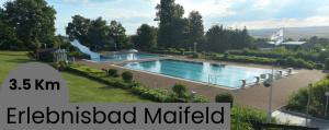 Vista de la piscina de Zzzimple - Staffless & Self Check-In o d'una piscina que hi ha a prop