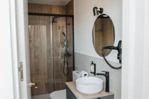 Kúpeľňa v ubytovaní esZentrico Suites Jerez