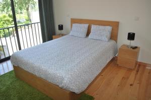 Кровать или кровати в номере Casa do Villas