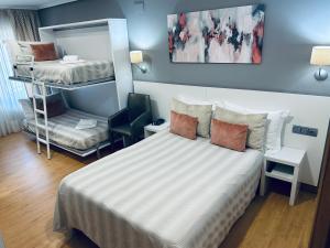 Кровать или кровати в номере Hotel Las Olas