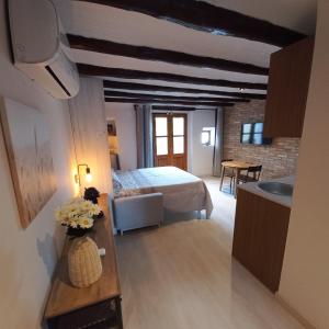 Ένα ή περισσότερα κρεβάτια σε δωμάτιο στο La Llacuna