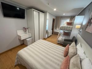 Кровать или кровати в номере Hotel Las Olas