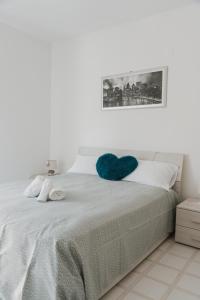 Katil atau katil-katil dalam bilik di Casa vacanze La Farfalla