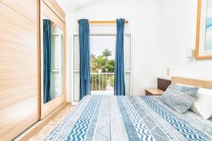 Postel nebo postele na pokoji v ubytování DUPLEX en PARAÍSO
