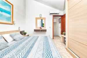 Postel nebo postele na pokoji v ubytování DUPLEX en PARAÍSO