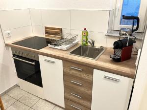Η κουζίνα ή μικρή κουζίνα στο Ruhige Wohnung nahe Traunreut