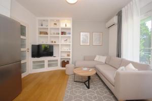 Televízia a/alebo spoločenská miestnosť v ubytovaní Park view apartments