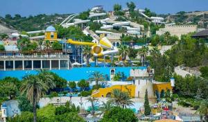 a view of a theme park with a resort at Lindos Villa Estelle in Líndos