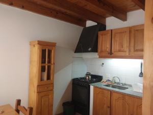 A kitchen or kitchenette at Duplex Lola Mora