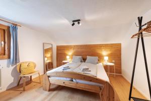 Postel nebo postele na pokoji v ubytování Chalet Stanzertal