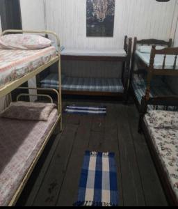 מיטה או מיטות קומותיים בחדר ב-Spot Jaguar Pantanal South Lodgen