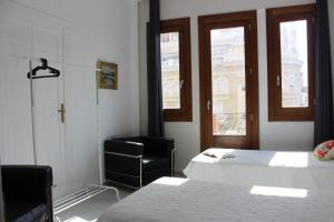 Cama o camas de una habitación en Torres de Valencia Apartments