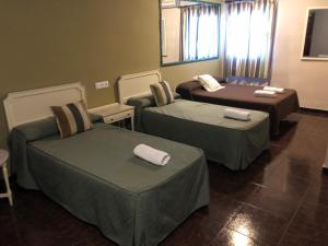 Posteľ alebo postele v izbe v ubytovaní Hotel Molino De Saydo
