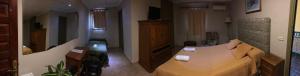 Posteľ alebo postele v izbe v ubytovaní Hotel Molino De Saydo