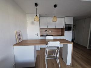 Kuchyňa alebo kuchynka v ubytovaní Appartement proche plages