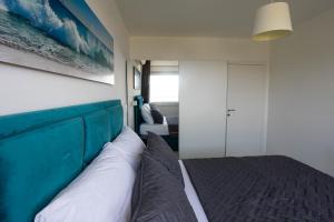 Posteľ alebo postele v izbe v ubytovaní Sunshine House Makarska with Free Beach Parking