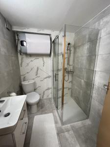 Kúpeľňa v ubytovaní Apartman Magura 37