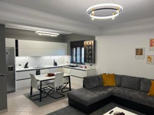 Гостиная зона в Manga Luxury Apartments