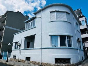 a white building with a round top at Romance in Pomorie