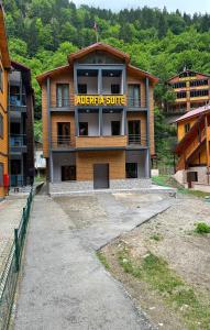 a building with a sign that reads ranger suite at Aderfia Suite in Uzungöl