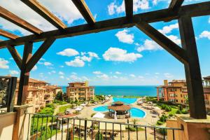 a view from the balcony of a resort with a swimming pool at Kaliakria Sea View Apartments in Topola