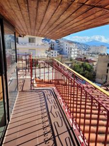 a balcony with a view of a city at Apartamente plazhi in Sarandë