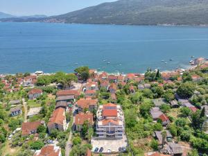 an aerial view of a town next to a body of water at Garni Hotel Milica in Herceg-Novi