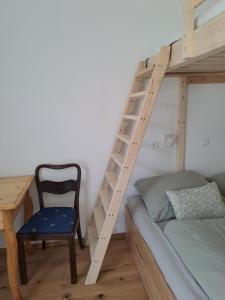 Postel nebo postele na pokoji v ubytování Mirabelka Rakvice