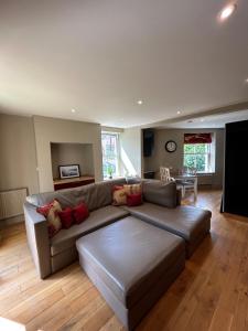 a living room with a couch and a table at Luxury Apartment - Great Location in Ecclesall
