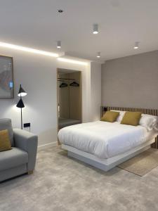 Postel nebo postele na pokoji v ubytování Apartamentos Forxán