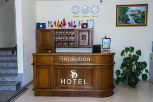 a hotel reception desk in a room with a hotel at SD David Hotel in Yerevan