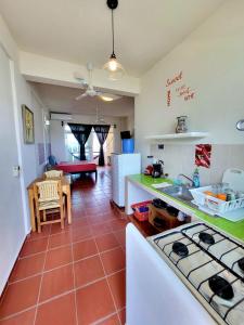 A kitchen or kitchenette at Casa Puerto Bonito & Private Coworking