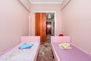 Postel nebo postele na pokoji v ubytování Venetia's appartment