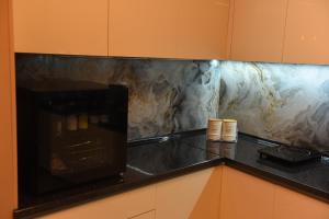 Kuchyň nebo kuchyňský kout v ubytování Premium Lux Apartman Čačak