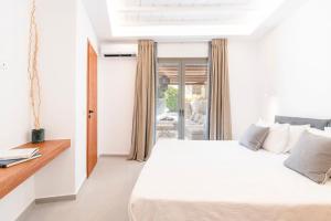 Posteľ alebo postele v izbe v ubytovaní Villa Zen - MG Villas Mykonos