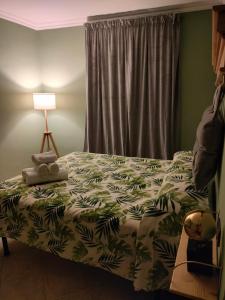 Een bed of bedden in een kamer bij Residenze del Bosco - Olivo