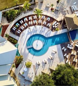 an overhead view of a swimming pool with a swimming pool at TOUMALACAÏ Appart 245 in Folle Anse